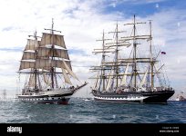 the-british-training-ship-stavros-s-niarchos-left-passes-the-russian-G60JRJ.jpg