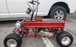 Custom-Motorized-red-wagon-at-Pickin-Under-The-Antlers-Automotive-Swap-Meet.jpg