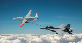 The-MQ-25-T1-test-asset-refuels-a-Navy-FA-18-during-a-flight-June-4-at-MidAmerica-Airport-in-I...png